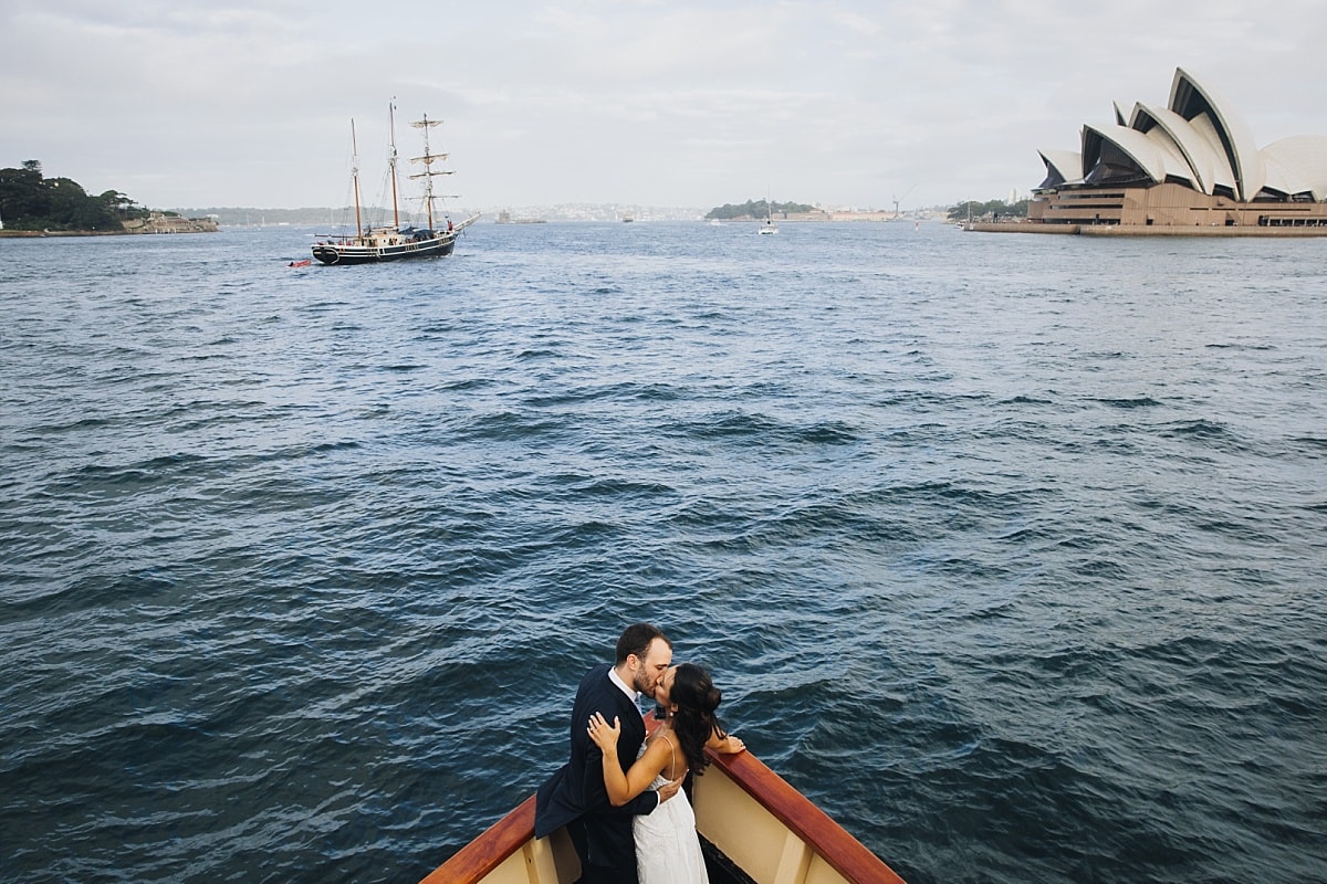 Bride and Groom on Ferry on Sydney Harbour overlooking Sydney Opera House